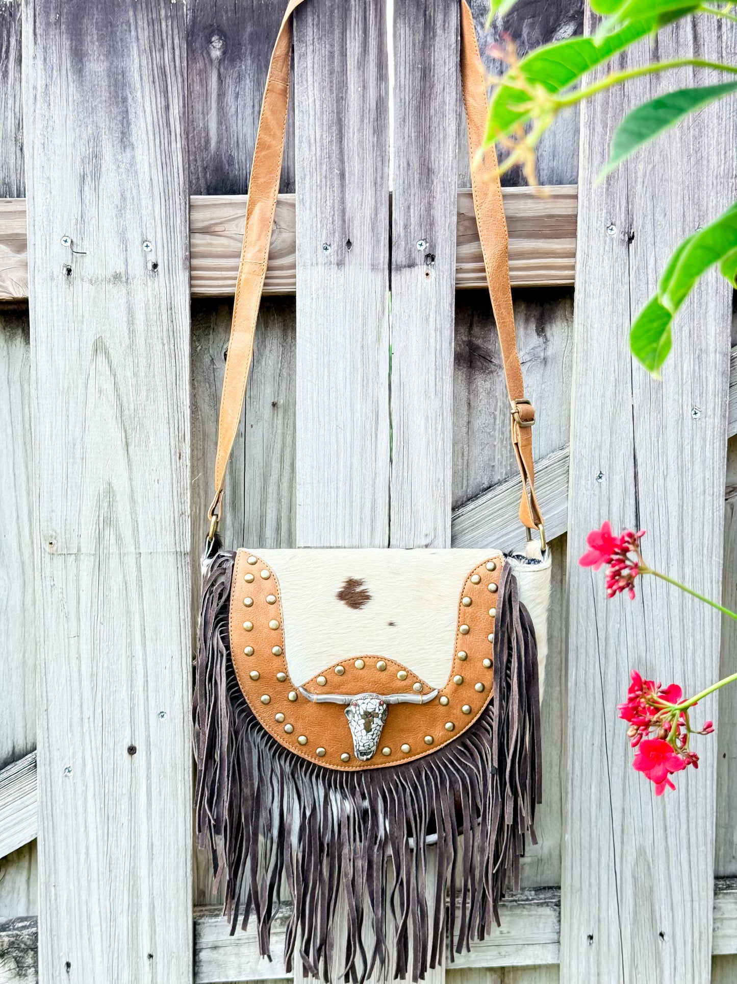 The Sundown Rider: Cowhide Fringe Crossbody with Bullhead Detail