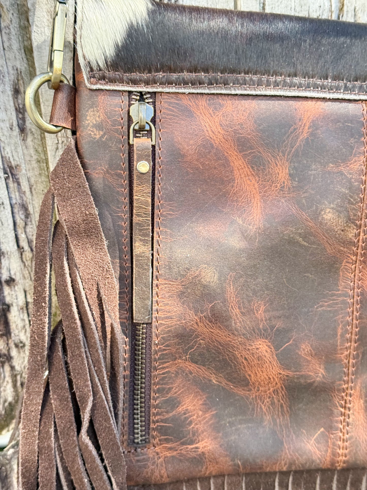 Midnight Thunder : Handcrafted Leather and Cowhide Concealed Carry Bag with Fringe Detail and Tbird Design