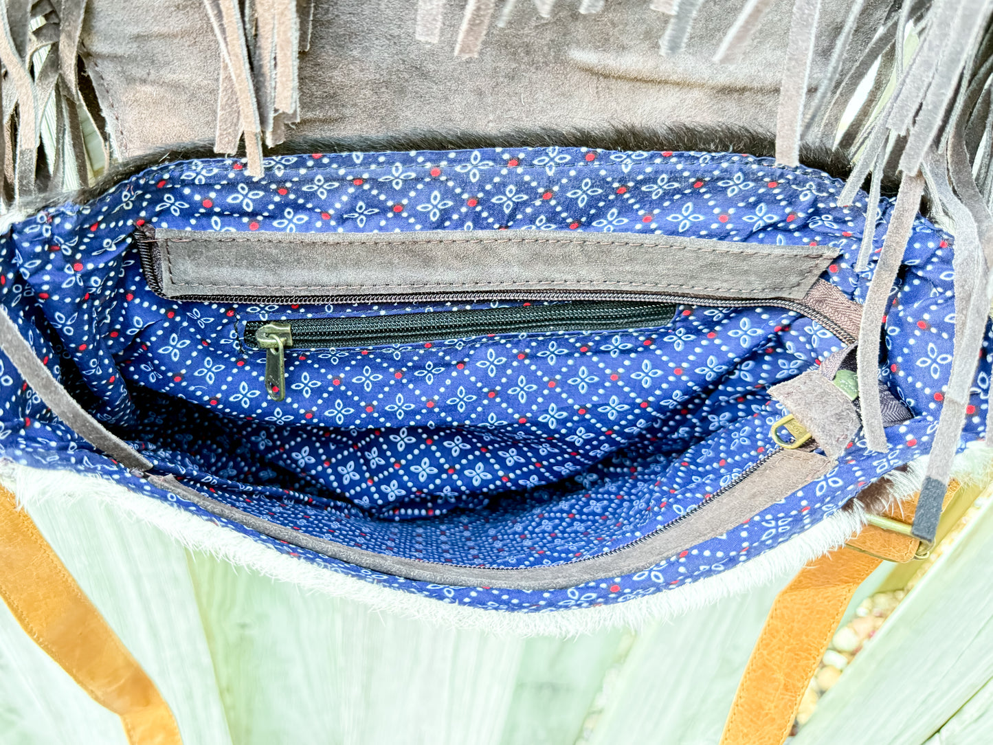 The Sundown Rider: Cowhide Fringe Crossbody with Bullhead Detail
