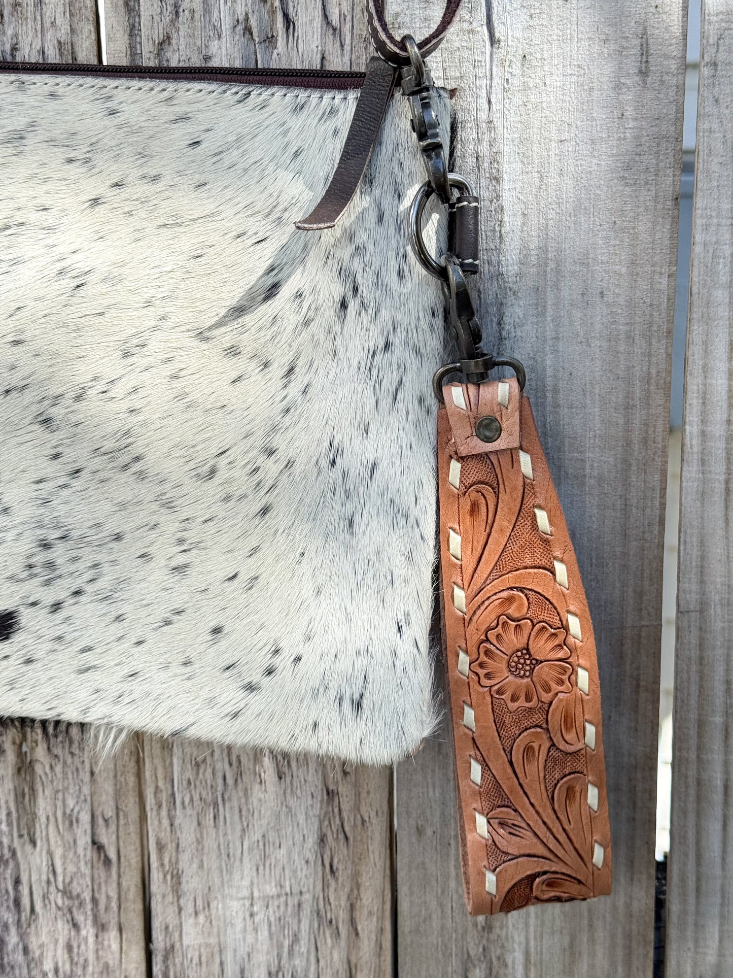Lariat Luxe : Black and White Cowhide with Tooled Leather Design Handstrap and Removable Crossbody Strap
