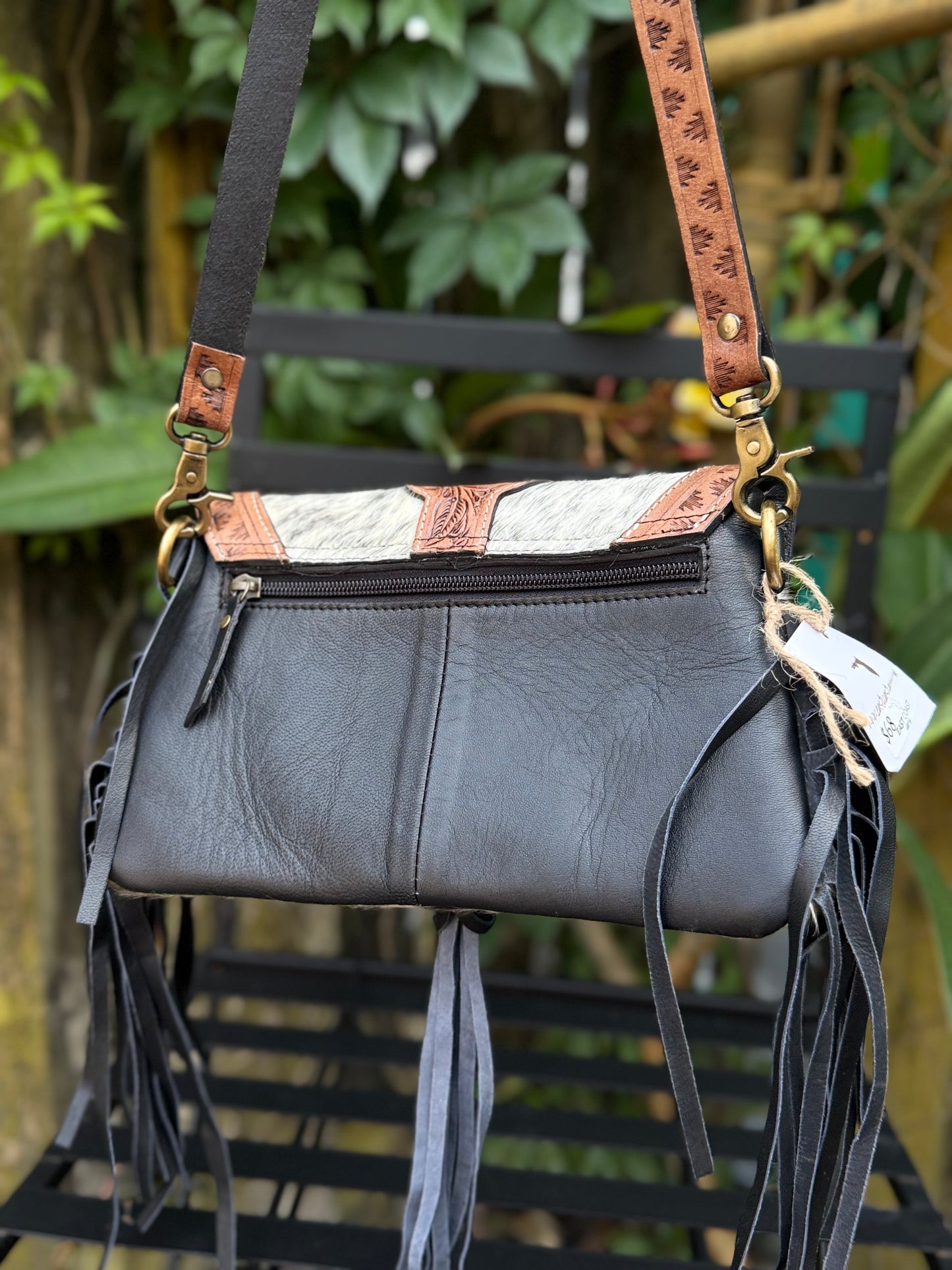 Bayou Bloom: Handtooled Leather and Cowhide Fringe Black and Brown Leather Crossbody with Fringe