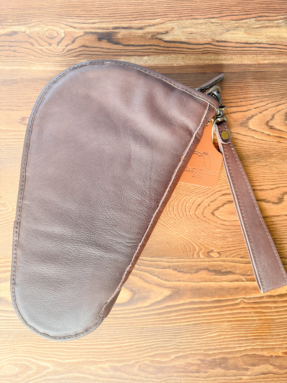 Back view of leather western cowhide padded gun case