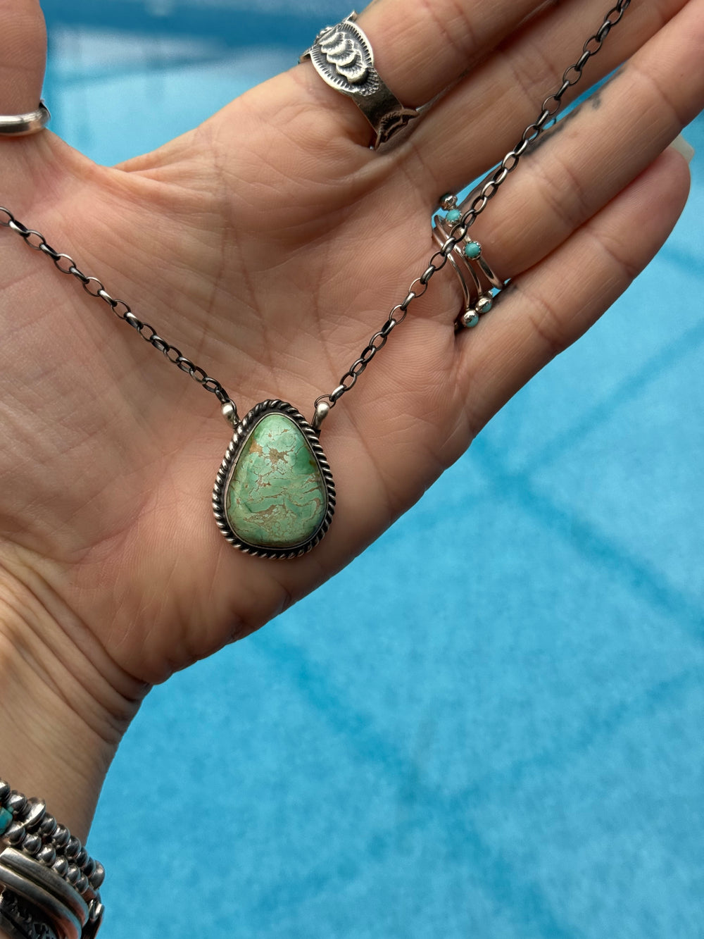 navajo royston turquoise pendant necklace sterling silver handmade chain
donovan skeet turquoise necklace 16 inch silver chain
native american turquoise pendant southwestern jewelry

