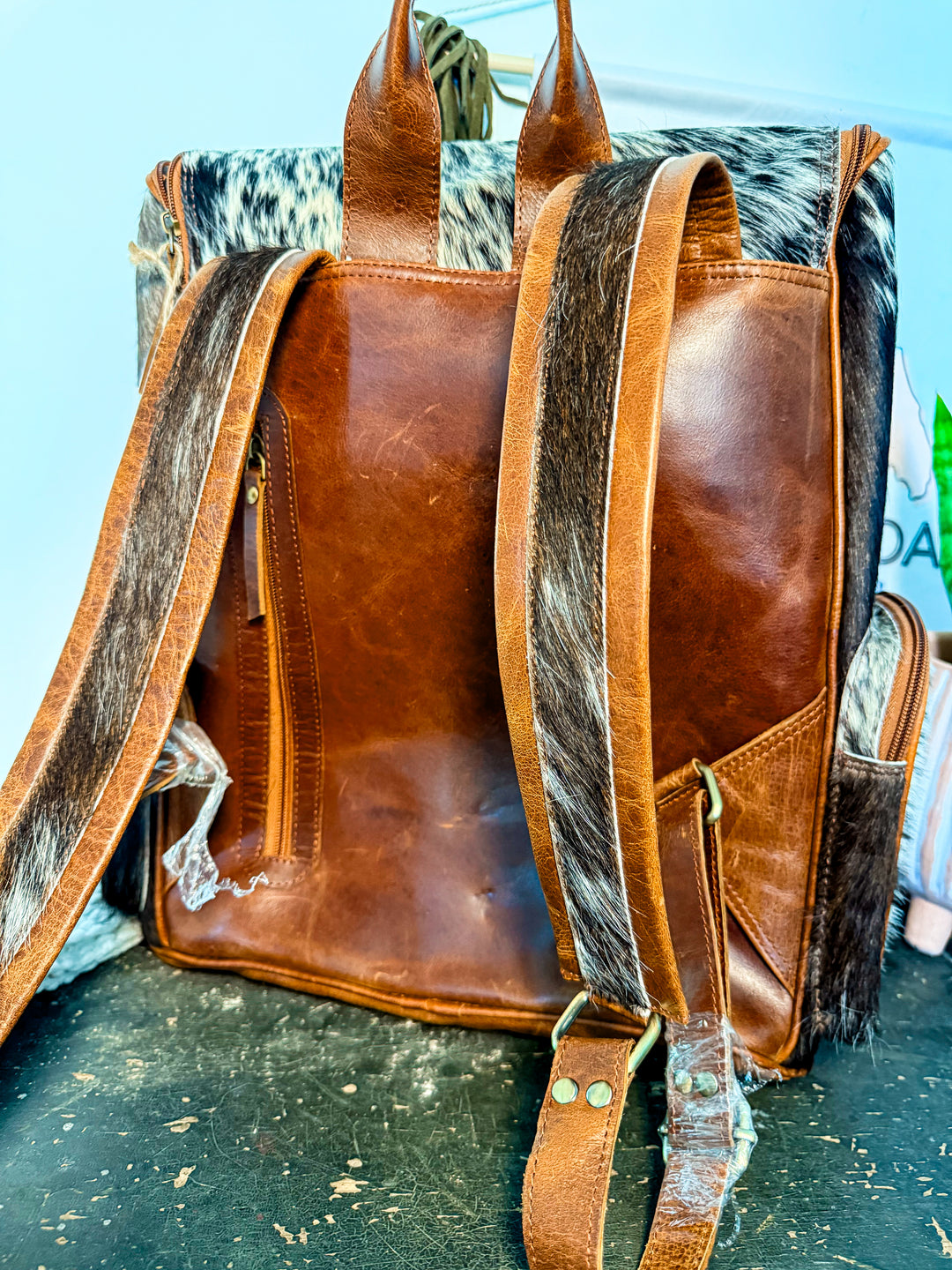The Bubba Bag | Hair on Cowhide Full Grain Leather All Adventures Backpack in Dark Hide Pattern