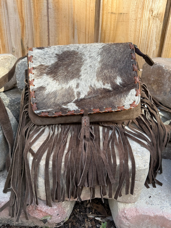 Suede leather fringe crossbody purse with genuine hair on cowhide flap and adjustable strap