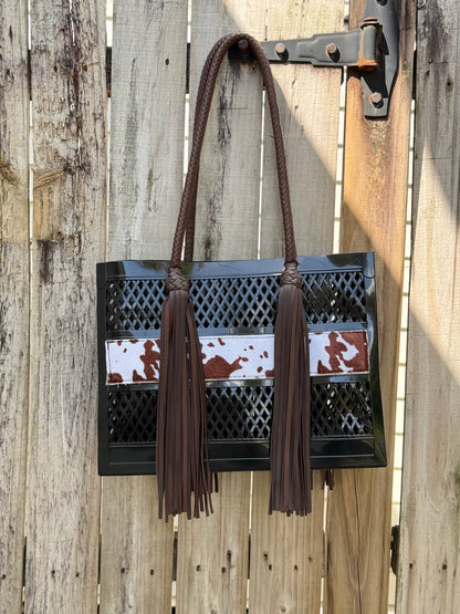 The Coastal Cowgirl - Western PVC Beach Bag with Cowprint Detail and Hand Braided Fringe Handles