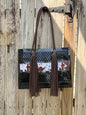 The Coastal Cowgirl - Western PVC Beach Bag with Cowprint Detail and Hand Braided Fringe Handles