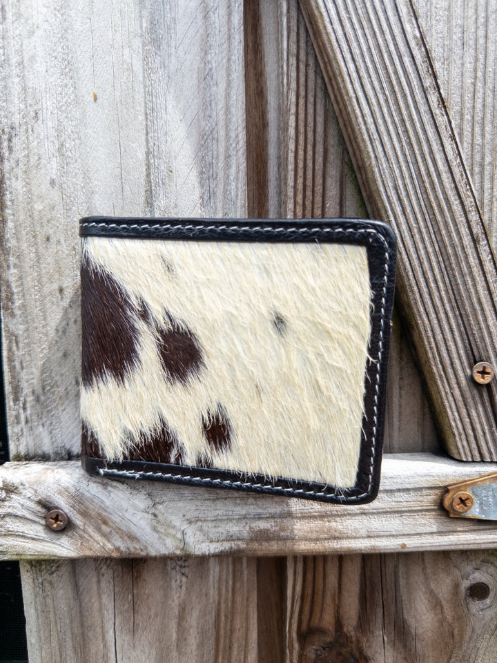 Black hair-on cowhide bifold wallet with black leather interior for men