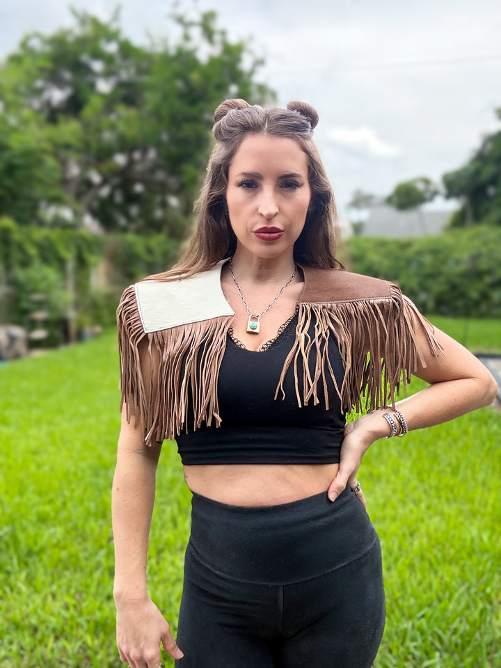 South Meets West genuine hair-on cowhide capelet with leather fringe worn over black top