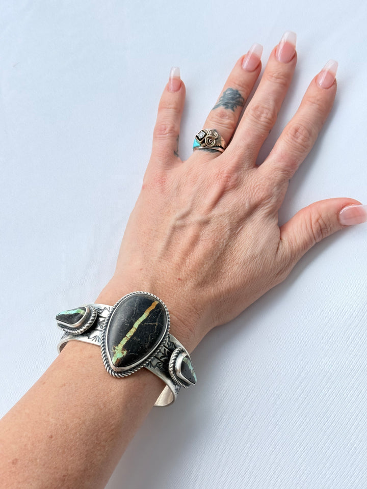 One of Seven | Rick Enriquez Navajo Black Jack Turquoise Sterling Silver Cuff