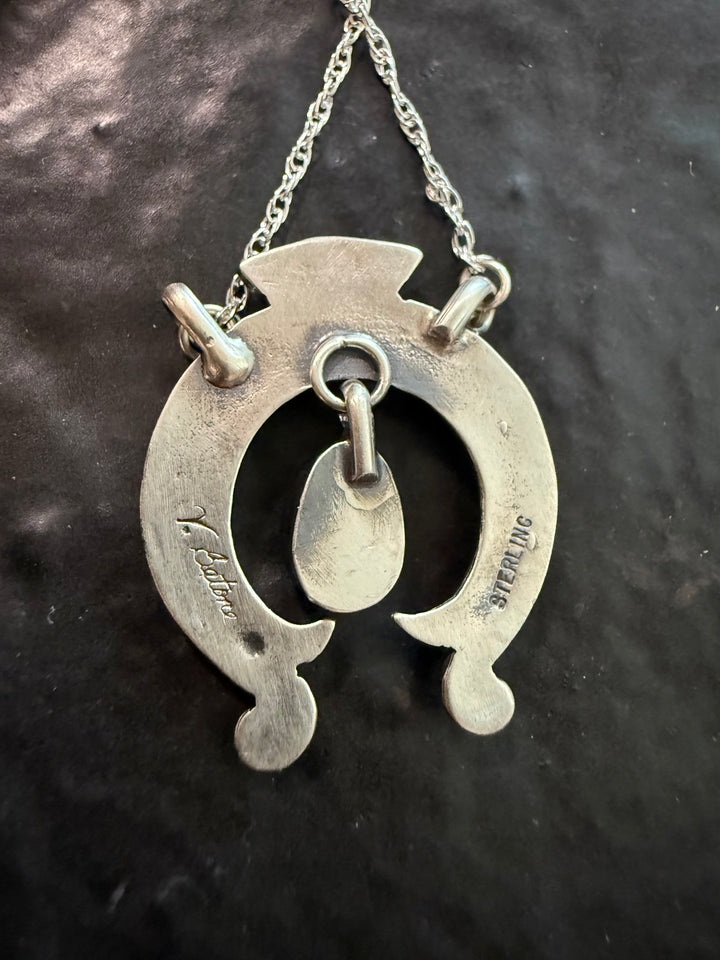 Back of mini Naja necklace and pendant showing Navajo handmade signature