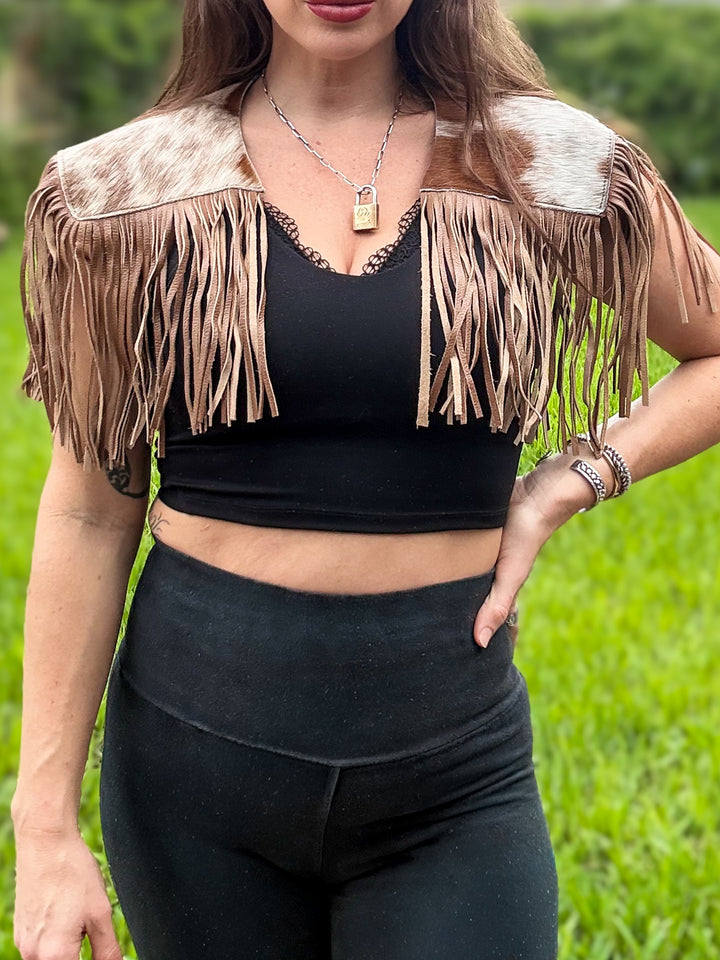 South Meets West genuine hair-on cowhide capelet with leather fringe worn over black top