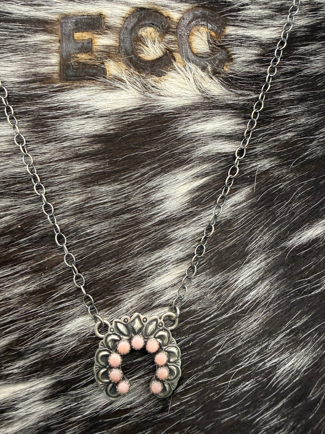 Handmade Navajo sterling silver naja necklace with pink conch stones signed by Native American artist R Livingston