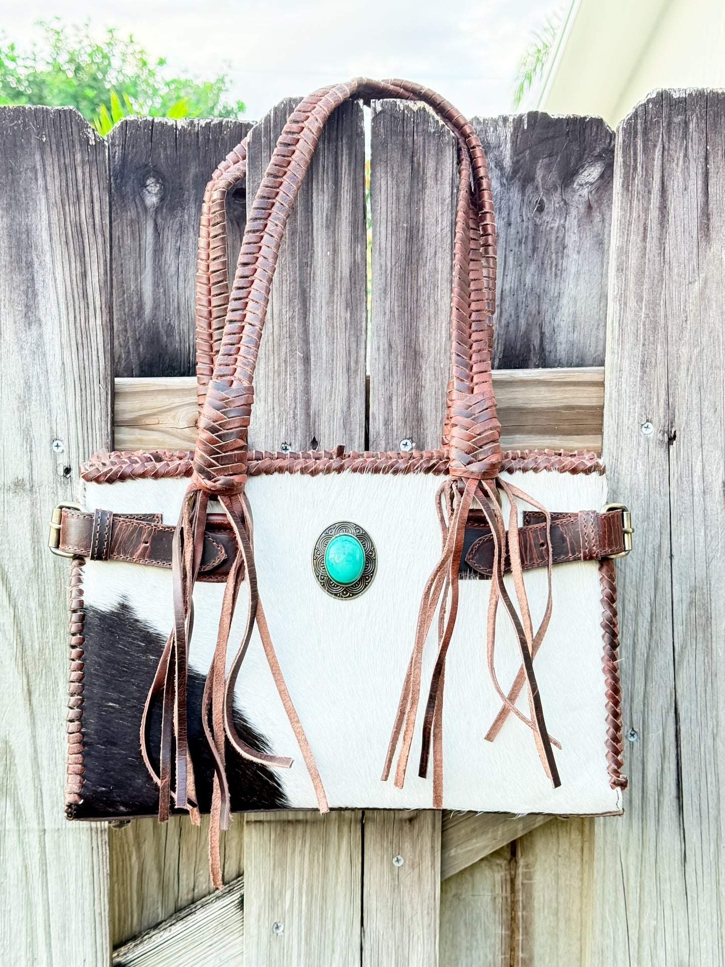 The Everglades Outrider: Distressed Brown Leather Western Purse with Braided Straps and Hair on Cowhide