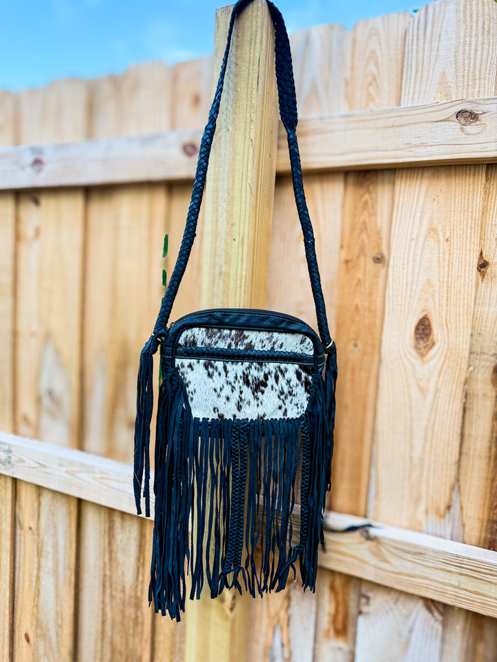 Black cowhide fringe crossbody bag with braided leather strap