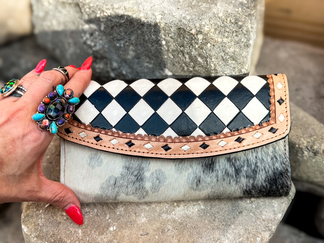 Speed Check black and ivory checkered leather flap wallet with genuine cowhide and tan leather trim.