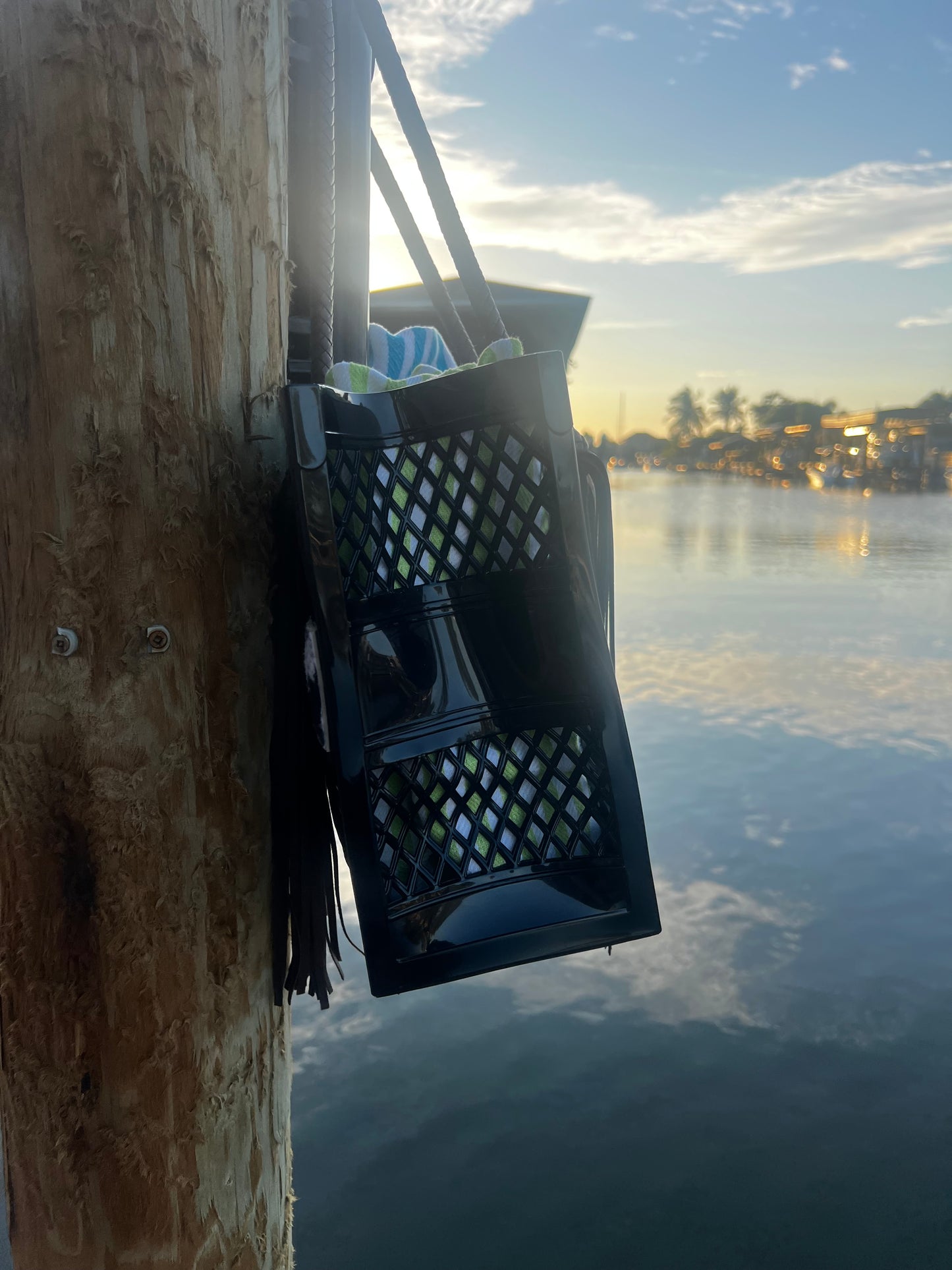 The Coastal Cowgirl - Western PVC Beach Bag with Cowprint Detail and Hand Braided Fringe Handles