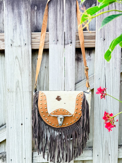 The Sundown Rider: Cowhide Fringe Crossbody with Bullhead Detail