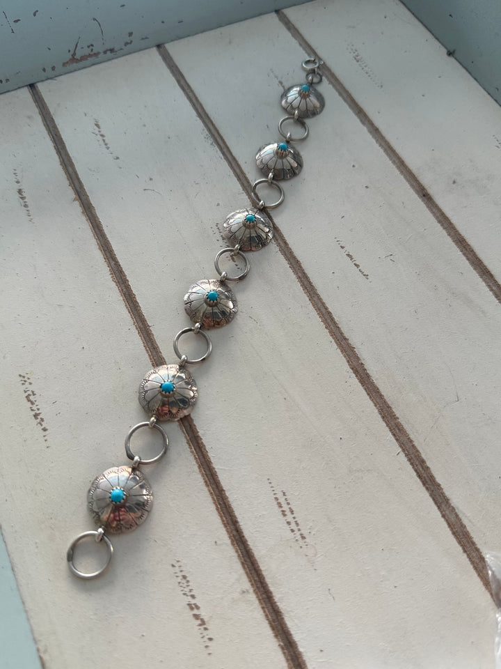 Estate sterling silver turquoise six concho link bracelet with stamped round conchos
