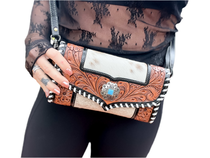Hand Tooled brown leather and cowhide clutch with strap