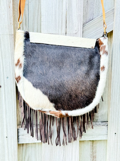 The Sundown Rider: Cowhide Fringe Crossbody with Bullhead Detail