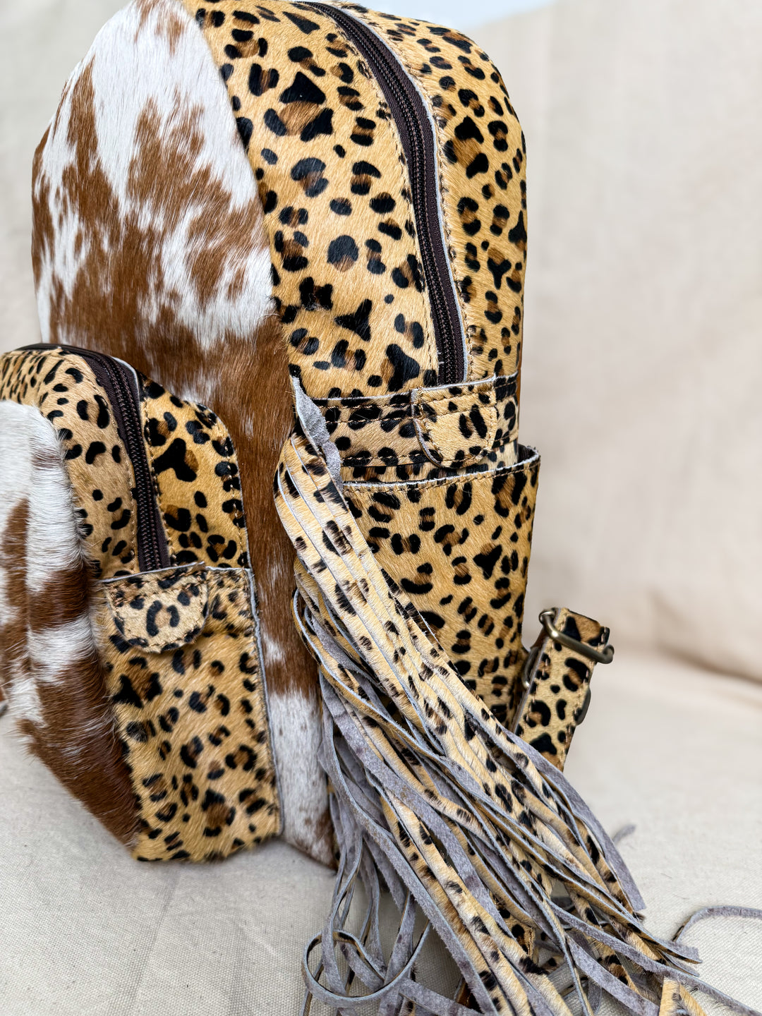 The Wild Hair Backpack | Genuine Hair-on Cowhide Leather Backpack with Leopard Print Fringe