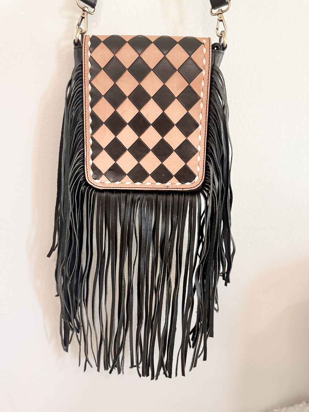 Black and beige full grain leather checkered crossbody bag with fringe from East Coast Carry Checkered Collection