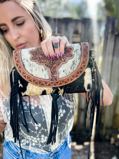 A touch of fringe front tooled cowhide crossbody