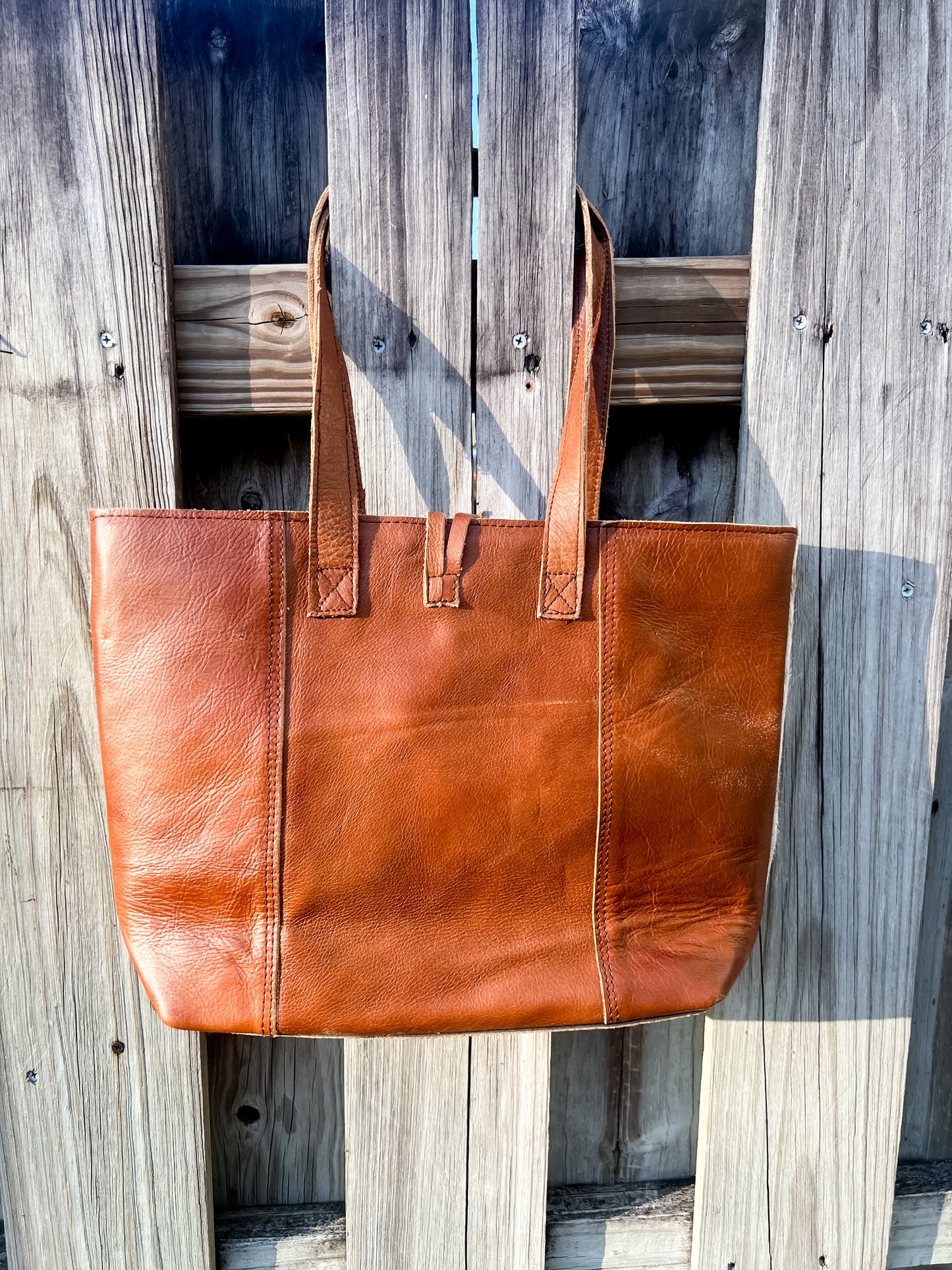 Cowhide leather tote in brown