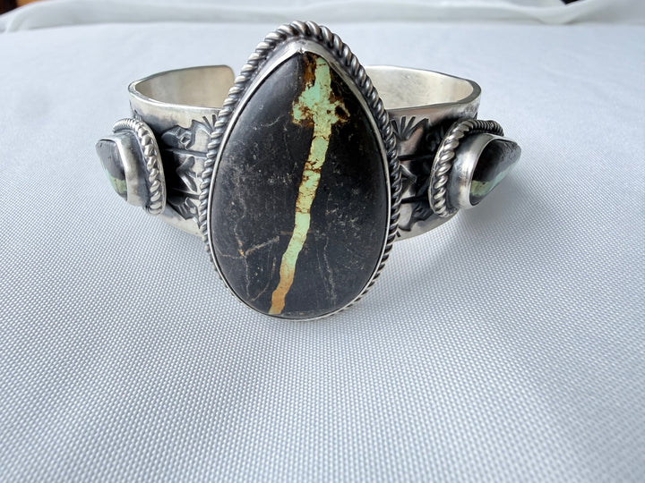 One of Seven | Rick Enriquez Navajo Black Jack Turquoise Sterling Silver Cuff