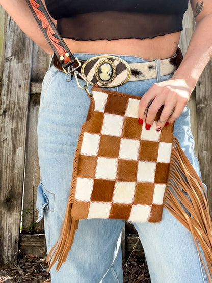 Cowhide checked fringe crossbody with black tooled strap