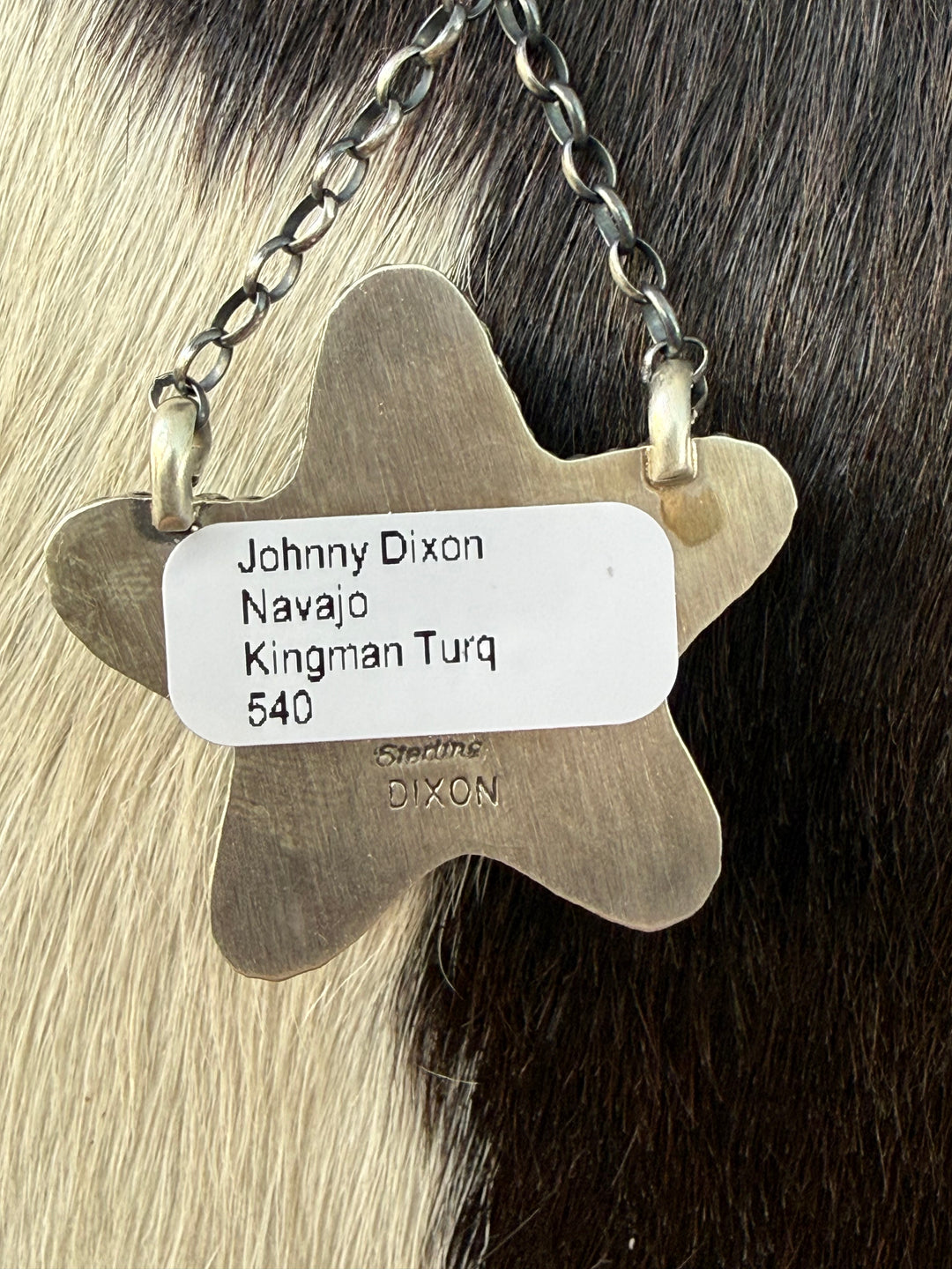 Johnny Dixon Navajo handmade sterling silver necklace with Kingman turquoise star pendant on handmade chain Showing artist Signature