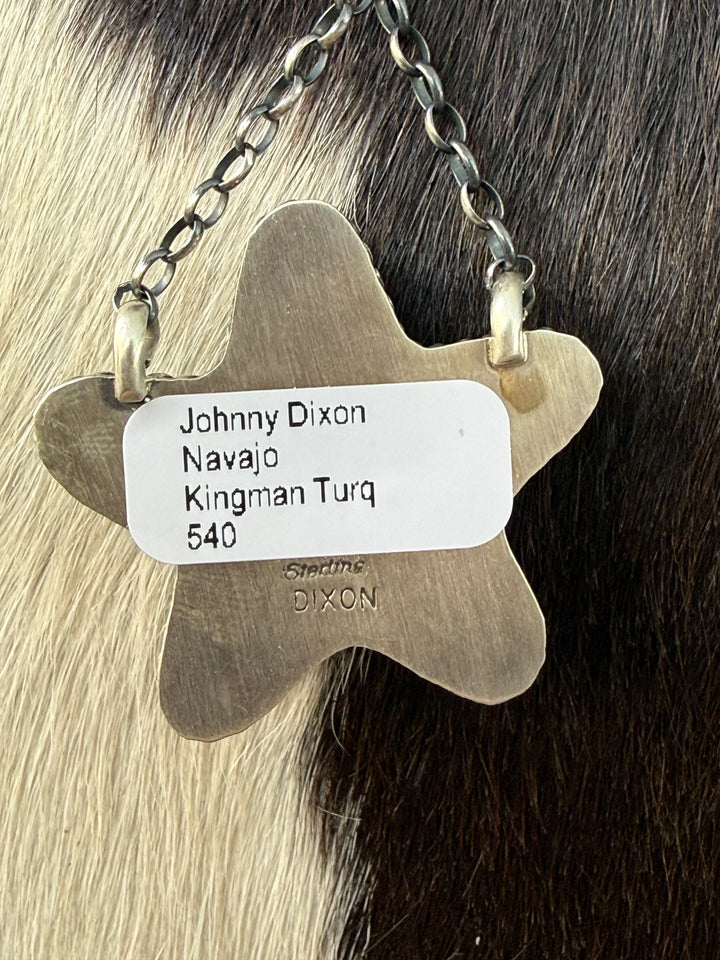 Johnny Dixon Navajo handmade sterling silver necklace with Kingman turquoise star pendant on handmade chain Showing artist Signature