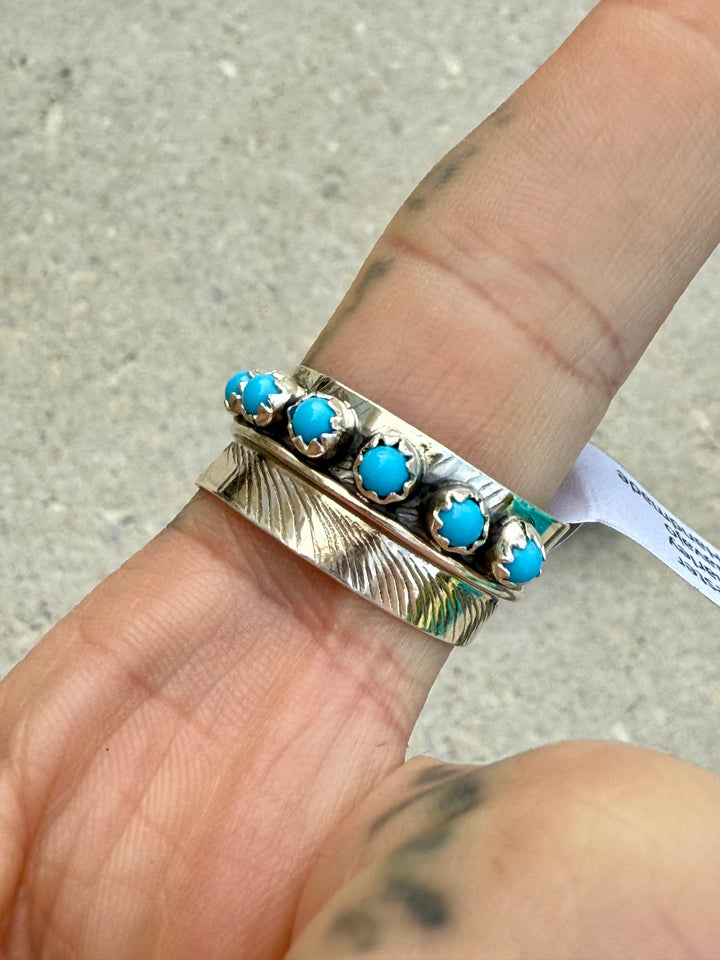 Back of the Sterling silver bypass feather Kingman Turquoise ring handmade by Navajo Chester Charley