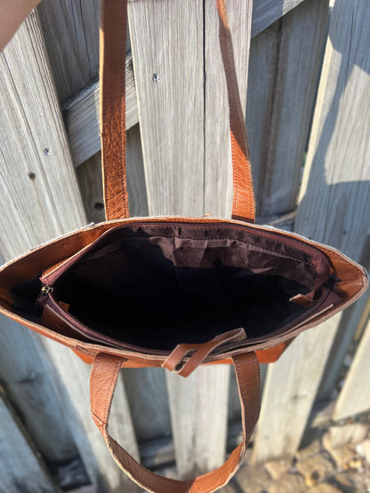 Cowhide leather tote in brown