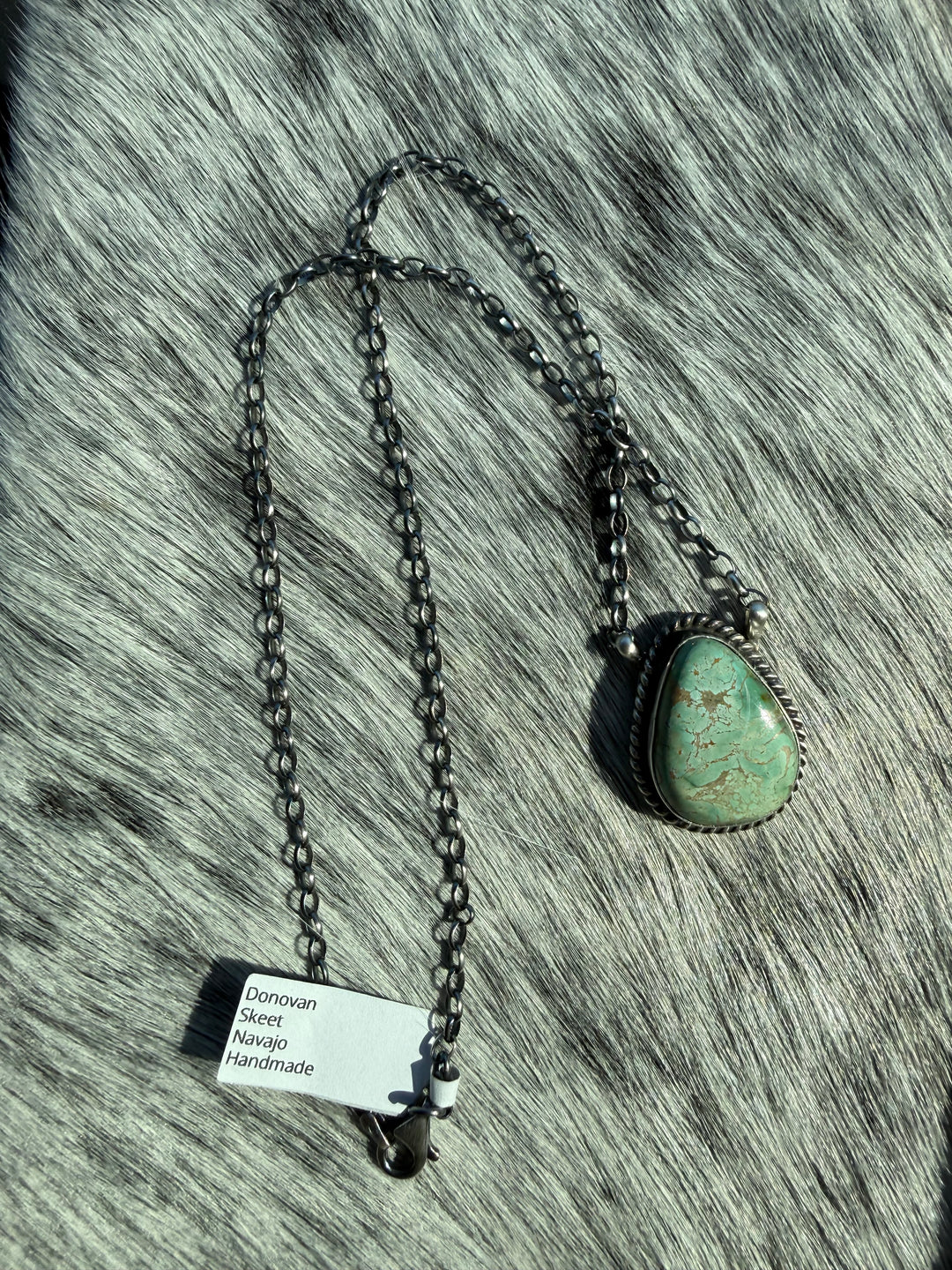 navajo royston turquoise pendant necklace sterling silver handmade chain
donovan skeet turquoise necklace 16 inch silver chain
native american turquoise pendant southwestern jewelry