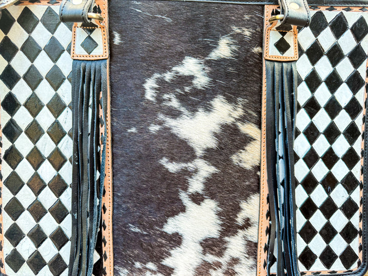 Handbag with checkered pattern and cowhide texture