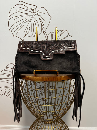 Fancy Seeing you Here: Tooled Brown Leather and Black Cowhide Hand Clutch