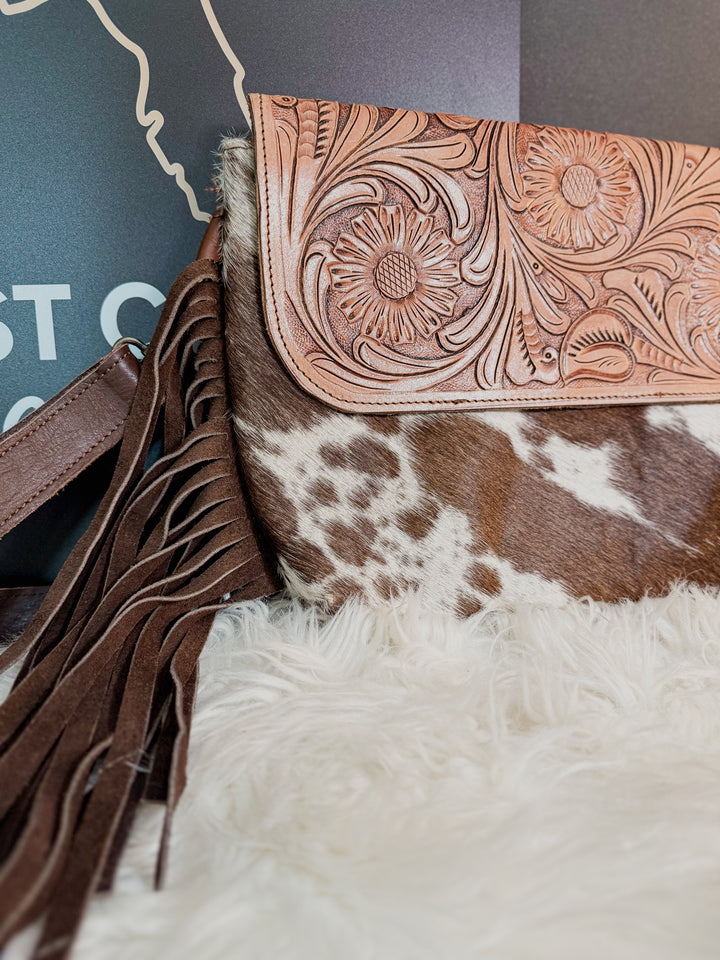 Grit & Grace | Hand Tooled Leather Cowhide and Brown Fringe Crossbody