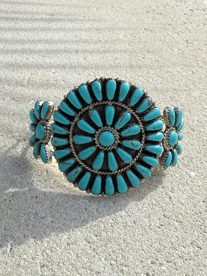 Native American sterling silver petit point turquoise cluster cuff signed DB with large turquoise center cluster and side clusters