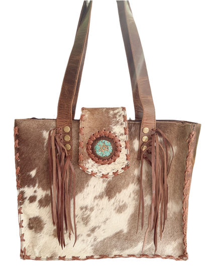 Palomino Bluff tote in hair-on cowhide and brown crunch leather with turquoise concho
