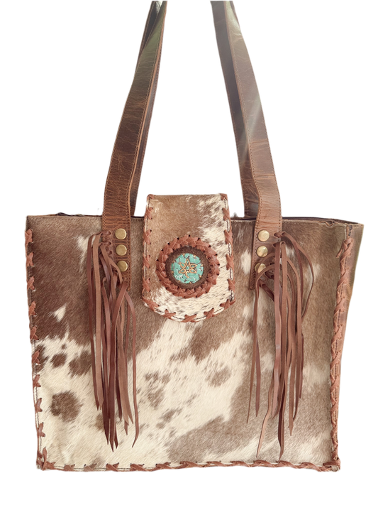 Palomino Bluff tote in hair-on cowhide and brown crunch leather with turquoise concho