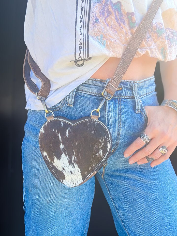 Brown and white hair\-on cowhide heart\-shaped mini crossbody bag with brown leather strap