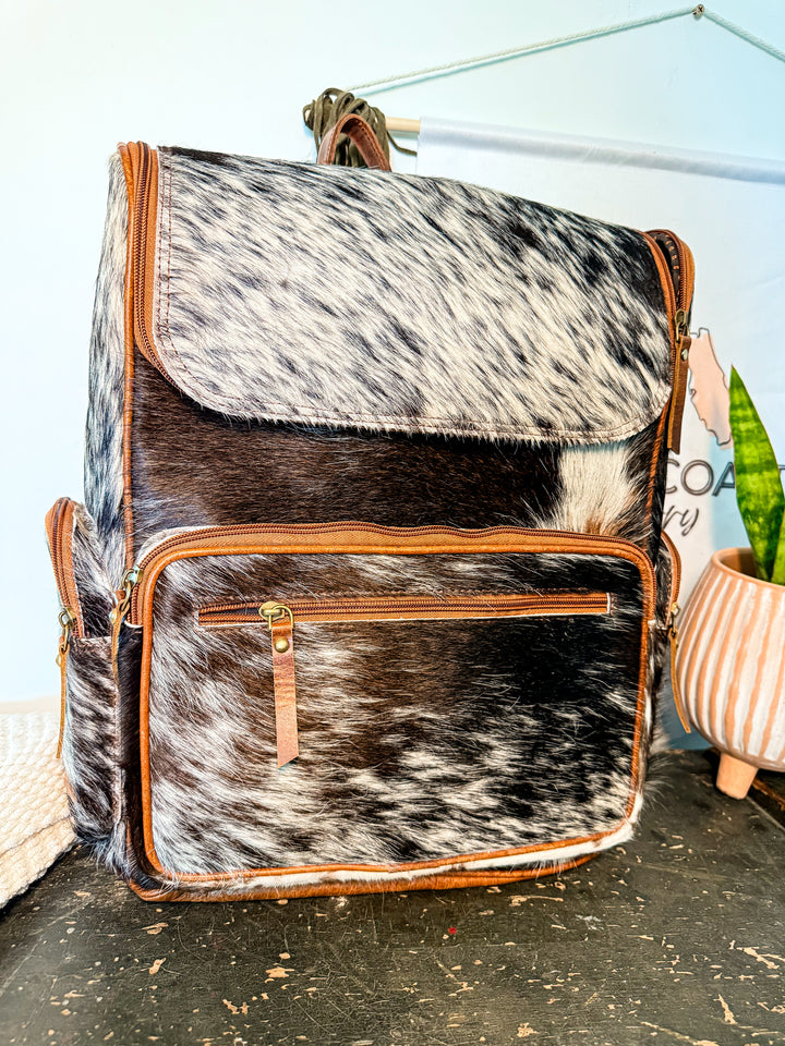 The Bubba Bag | Hair on Cowhide Full Grain Leather All Adventures Backpack in Dark Hide Pattern