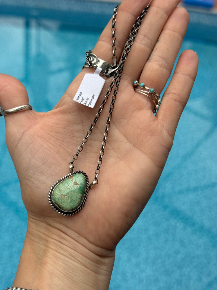 navajo royston turquoise pendant necklace sterling silver handmade chain
donovan skeet turquoise necklace 16 inch silver chain
native american turquoise pendant southwestern jewelry
