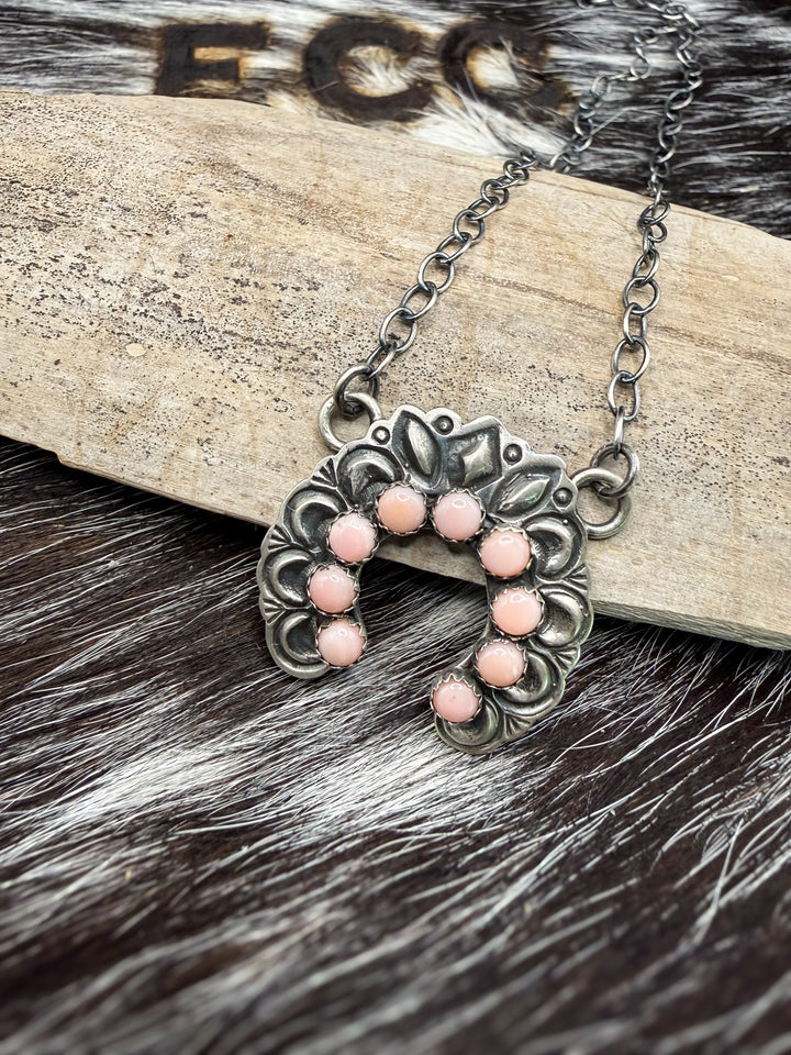 Handmade Navajo sterling silver naja necklace with pink conch stones signed by Native American artist R Livingston