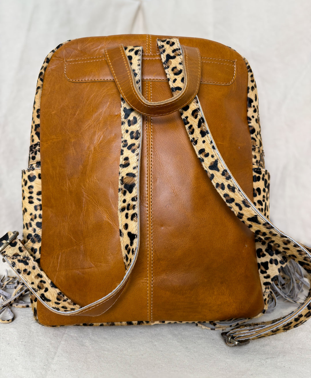 The Wild Hair Backpack | Genuine Hair-on Cowhide Leather Backpack with Leopard Print Fringe