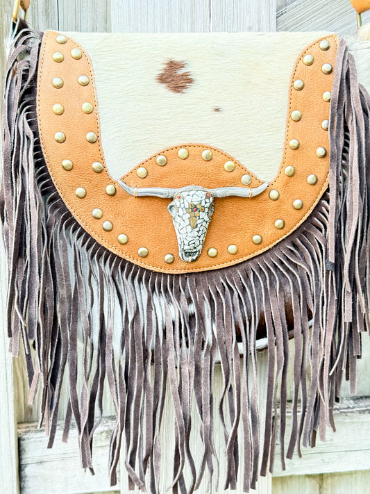 The Sundown Rider: Cowhide Fringe Crossbody with Bullhead Detail