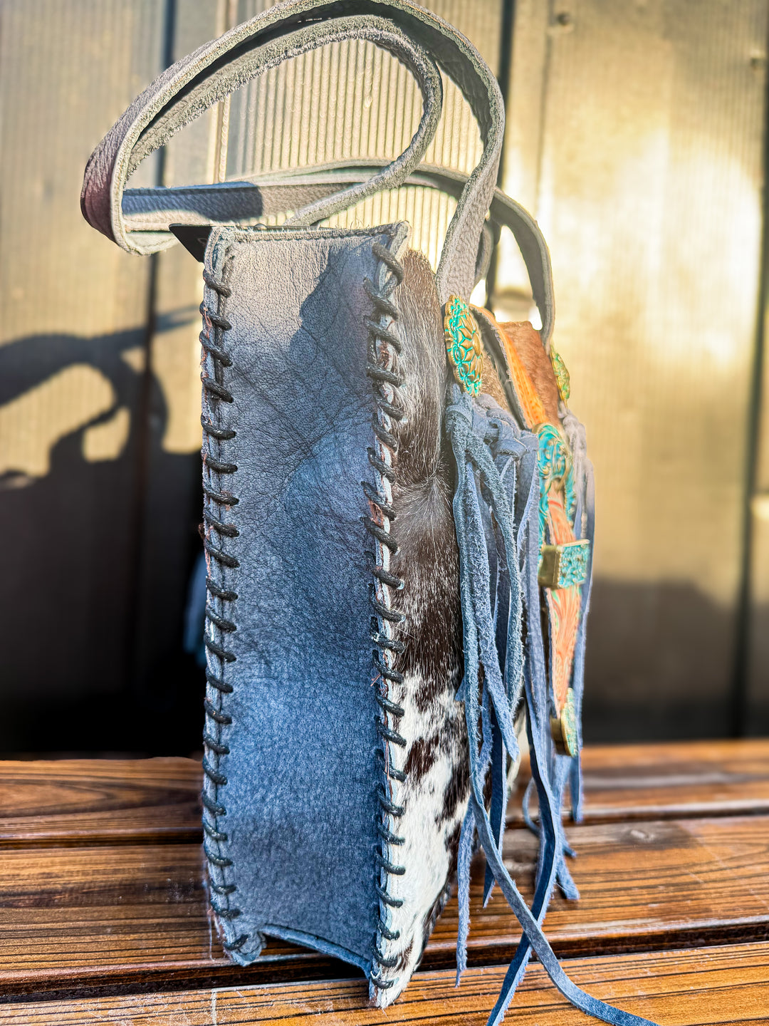 Denim blue leather cowhide concealed carry purse side view