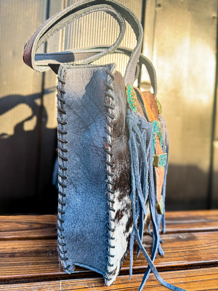 Denim blue leather cowhide concealed carry purse side view